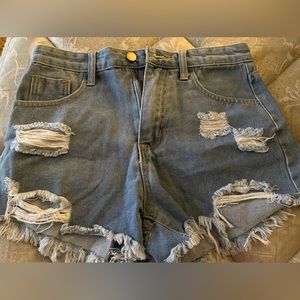 Ripped jean shorts